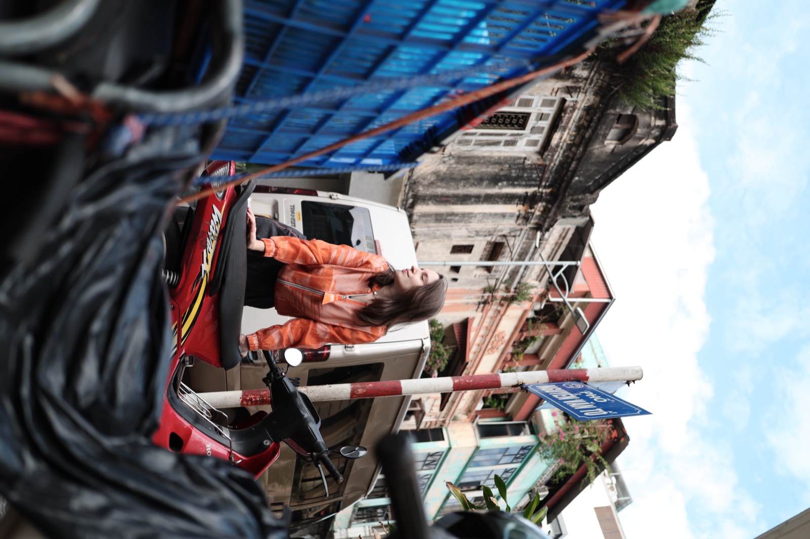 A self-portrait taken while wandering the streets of Hanoi, Vietnam